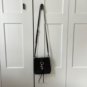 Rebecca Minkoff crossbody leather purse. Three tone studded metal accent